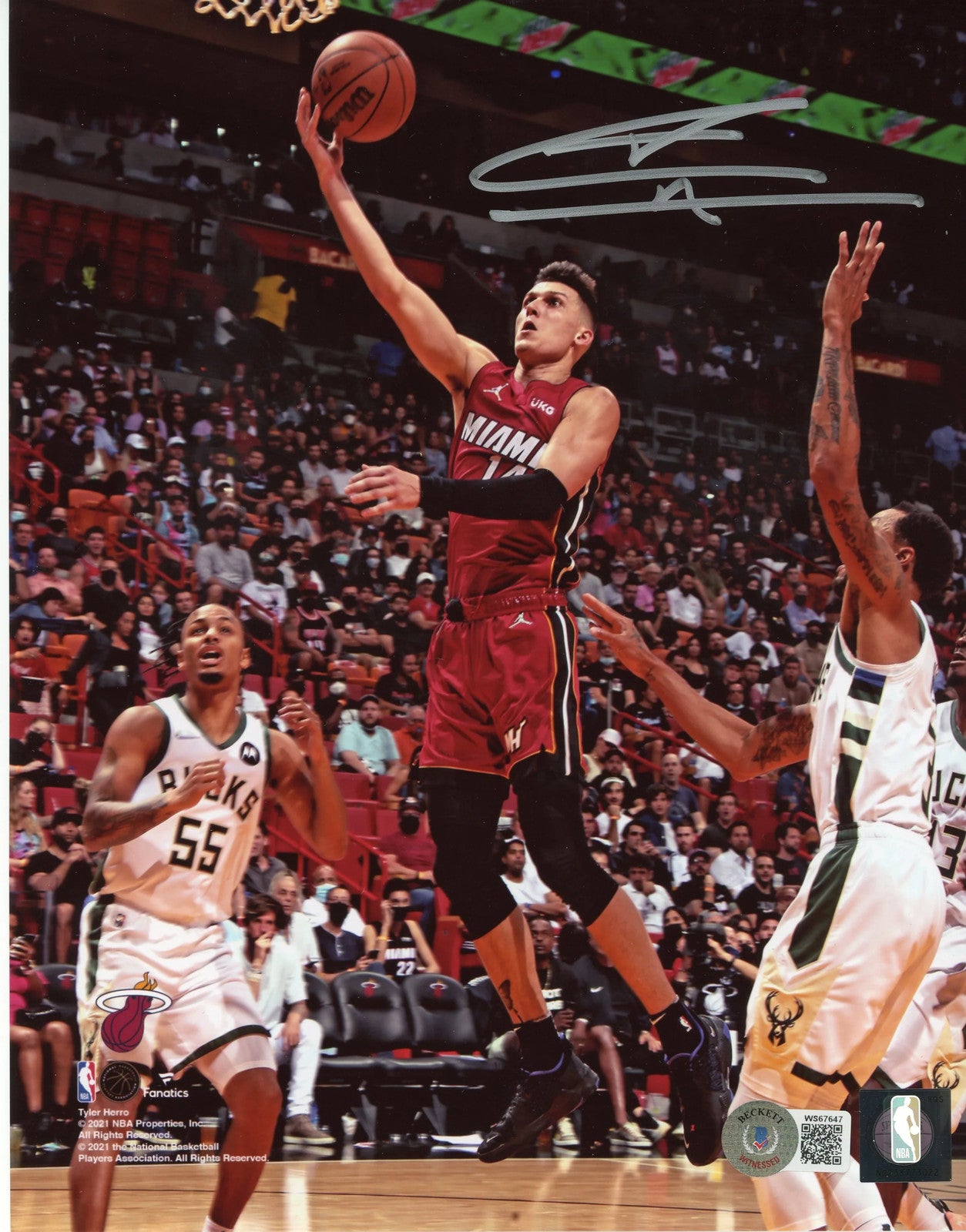 Tyler Herro Autographed Shooting 8X10 Basketball Photo (Beckett)