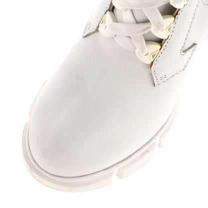 Prada Women'S Heeled Lug Sole Combat Boots Leather And Neoprene