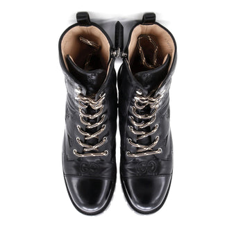 Gucci Women'S Platform Lug Sole Combat Boots Gg Embossed Leather