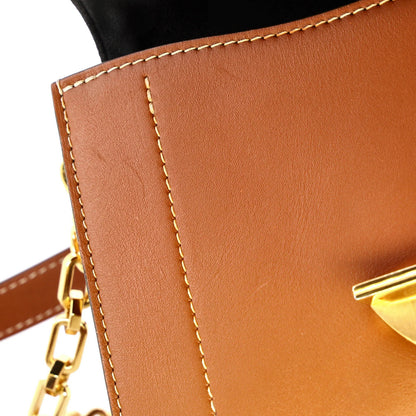 Canvas Louis Vuitton Biface Handbag Leather and Reverse Monogram