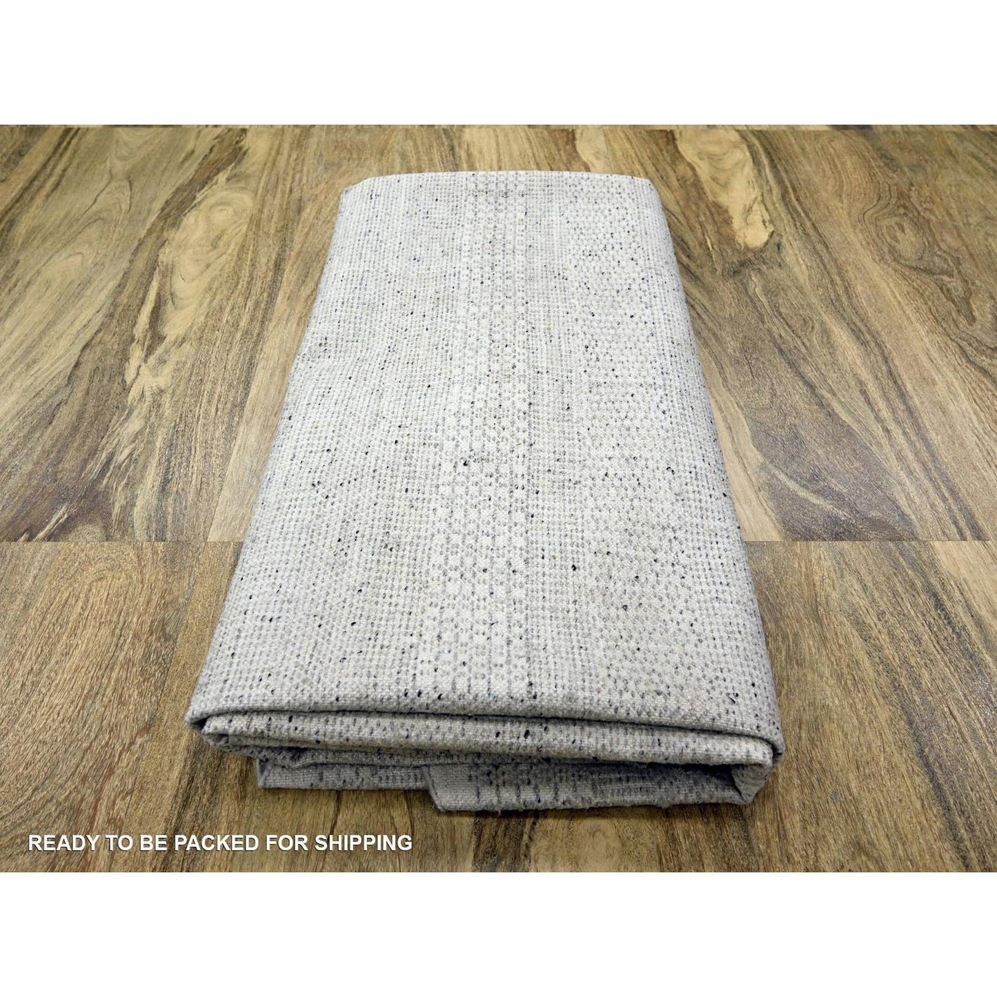 Hand knotted wool rug round oxidized distressed grass design gray
