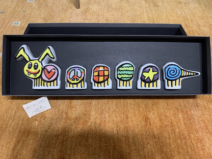 Multicolor ceramic character set by James Rizzi