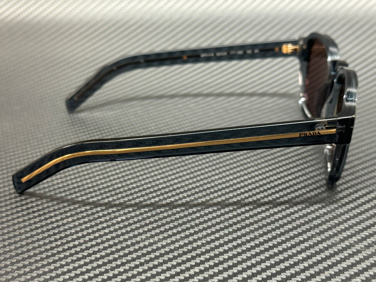 PRADA PR A16S 17T05D Transparent Blue Brown