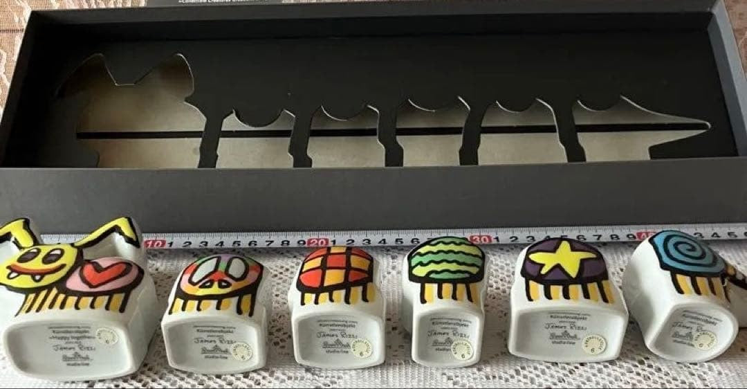Multicolor ceramic character set by James Rizzi