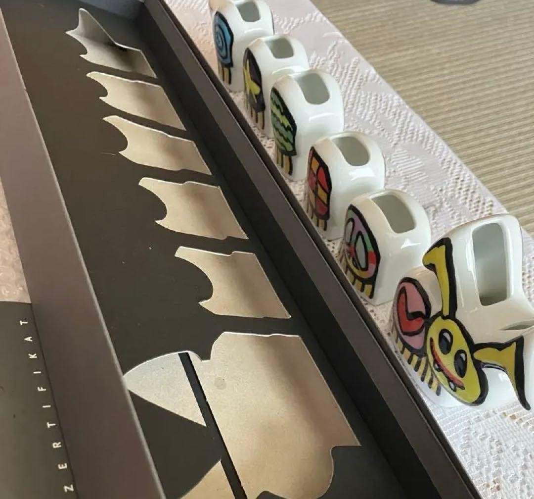 Multicolor ceramic character set by James Rizzi