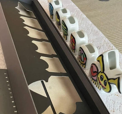 Multicolor ceramic character set by James Rizzi