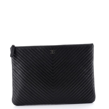 Chanel O Case Clutch Chevron Caviar Medium