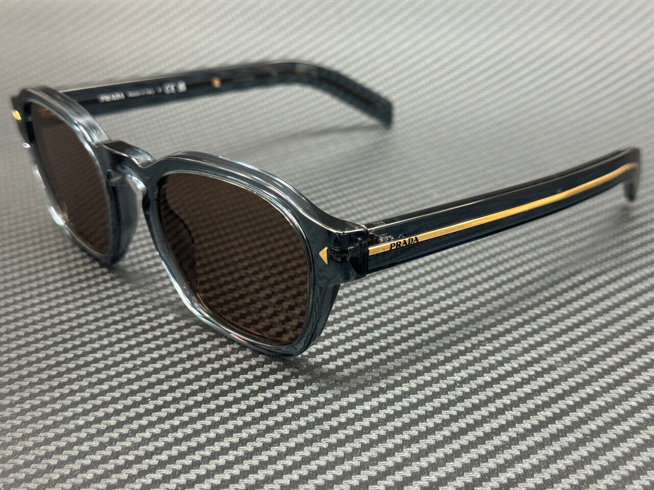 PRADA PR A16S 17T05D Transparent Blue Brown