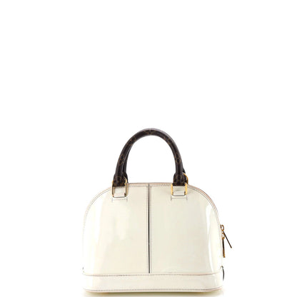 Louis Vuitton Alma Handbag Vernis With Monogram Canvas Bb