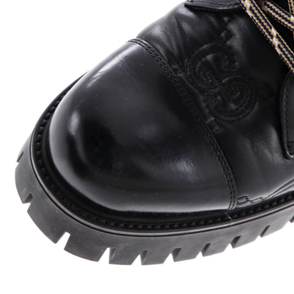 Gucci Women'S Platform Lug Sole Combat Boots Gg Embossed Leather