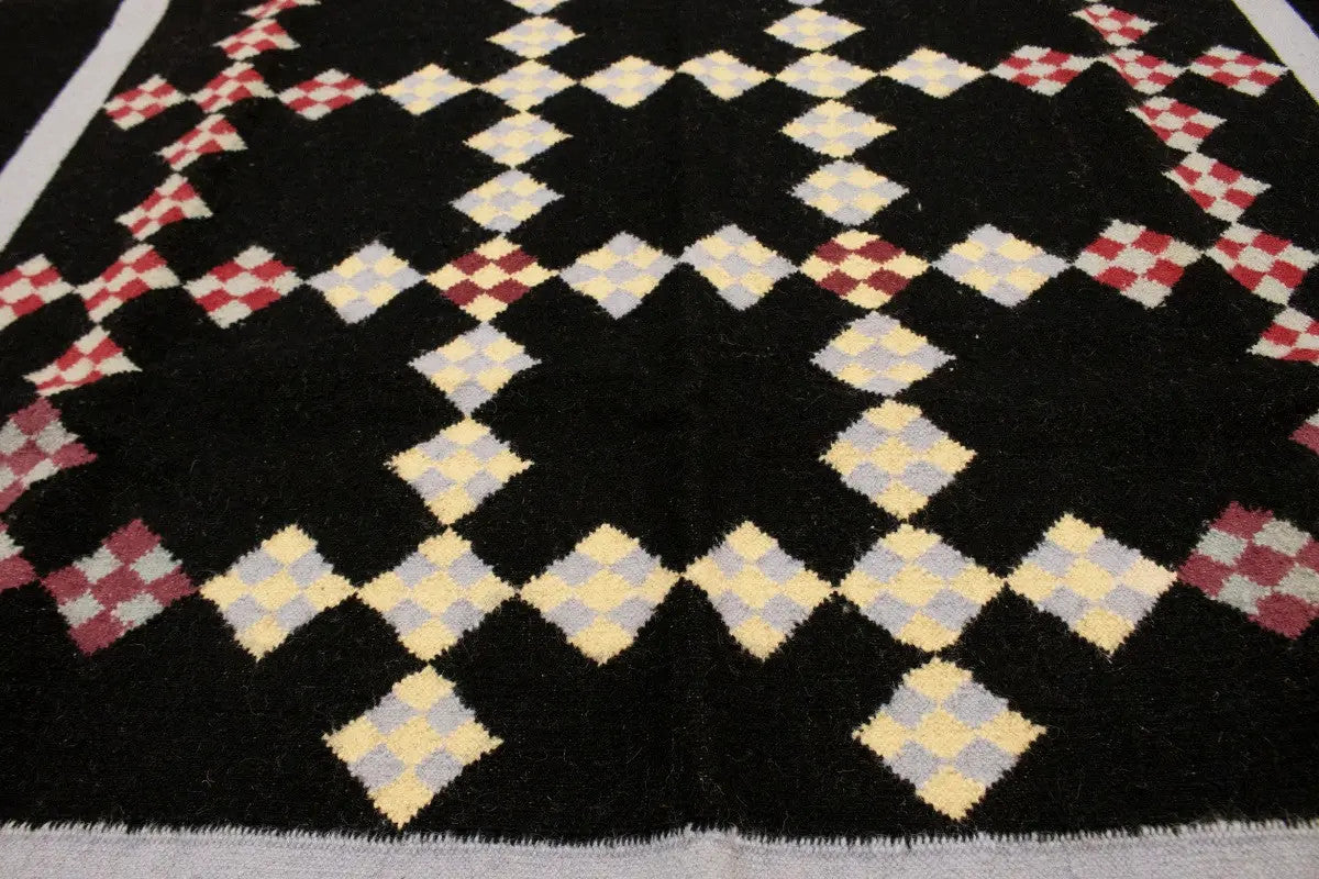 Black floral dhurrie wool rug flat weave reversible oriental carpet
