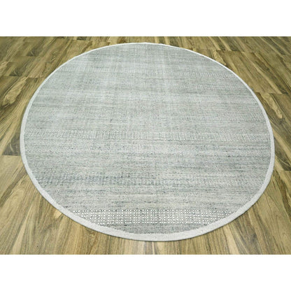 Hand knotted wool rug round oxidized distressed grass design gray