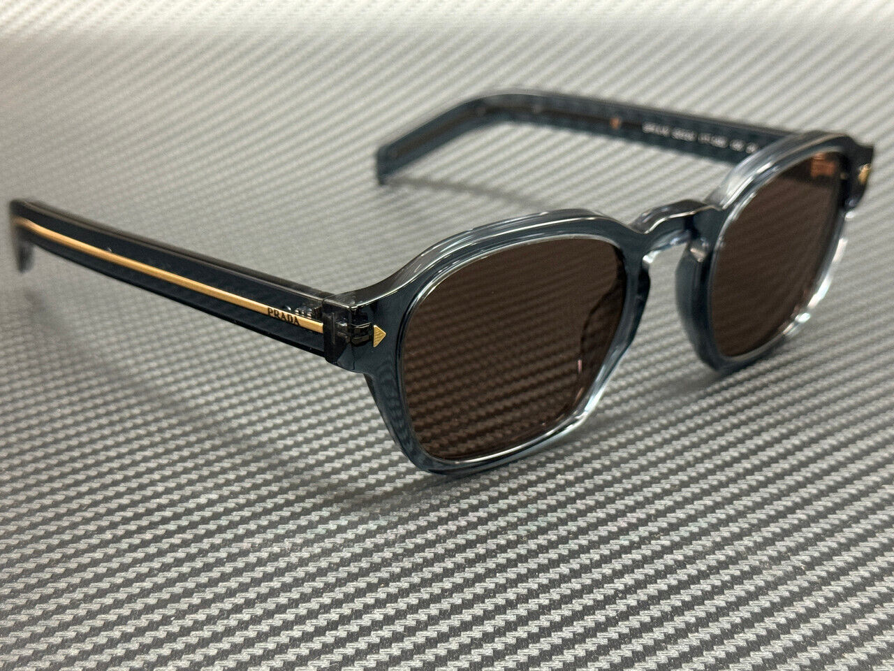 PRADA PR A16S 17T05D Transparent Blue Brown