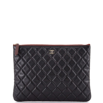 Chanel O Case Clutch Quilted Lambskin Medium