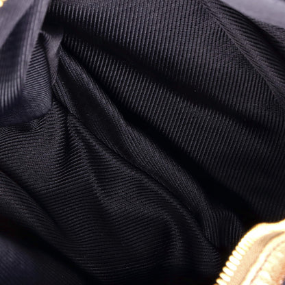 Louis Vuitton Irene Handbag Monogram Embossed Suede And Patent