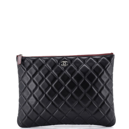 Chanel O Case Clutch Quilted Lambskin Medium