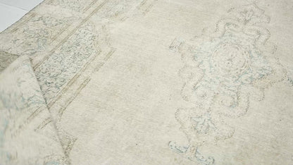 Handmade Muted Floral Distressed Oriental Rug
