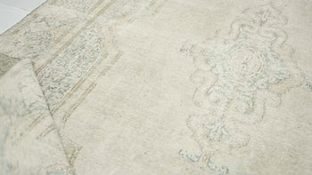 Handmade Muted Floral Distressed Oriental Rug
