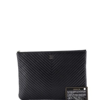 Chanel O Case Clutch Chevron Caviar Medium