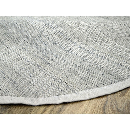 Hand knotted wool rug round oxidized distressed grass design gray