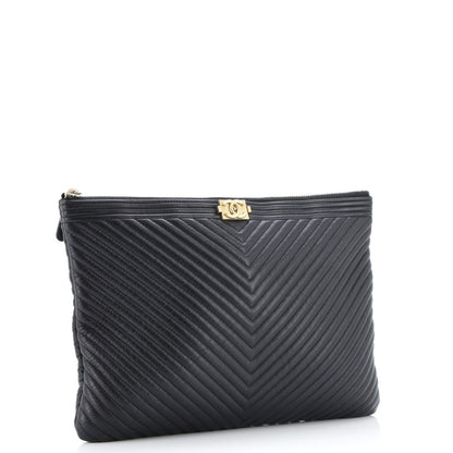 Chanel Boy O Case Clutch Chevron Calfskin Medium