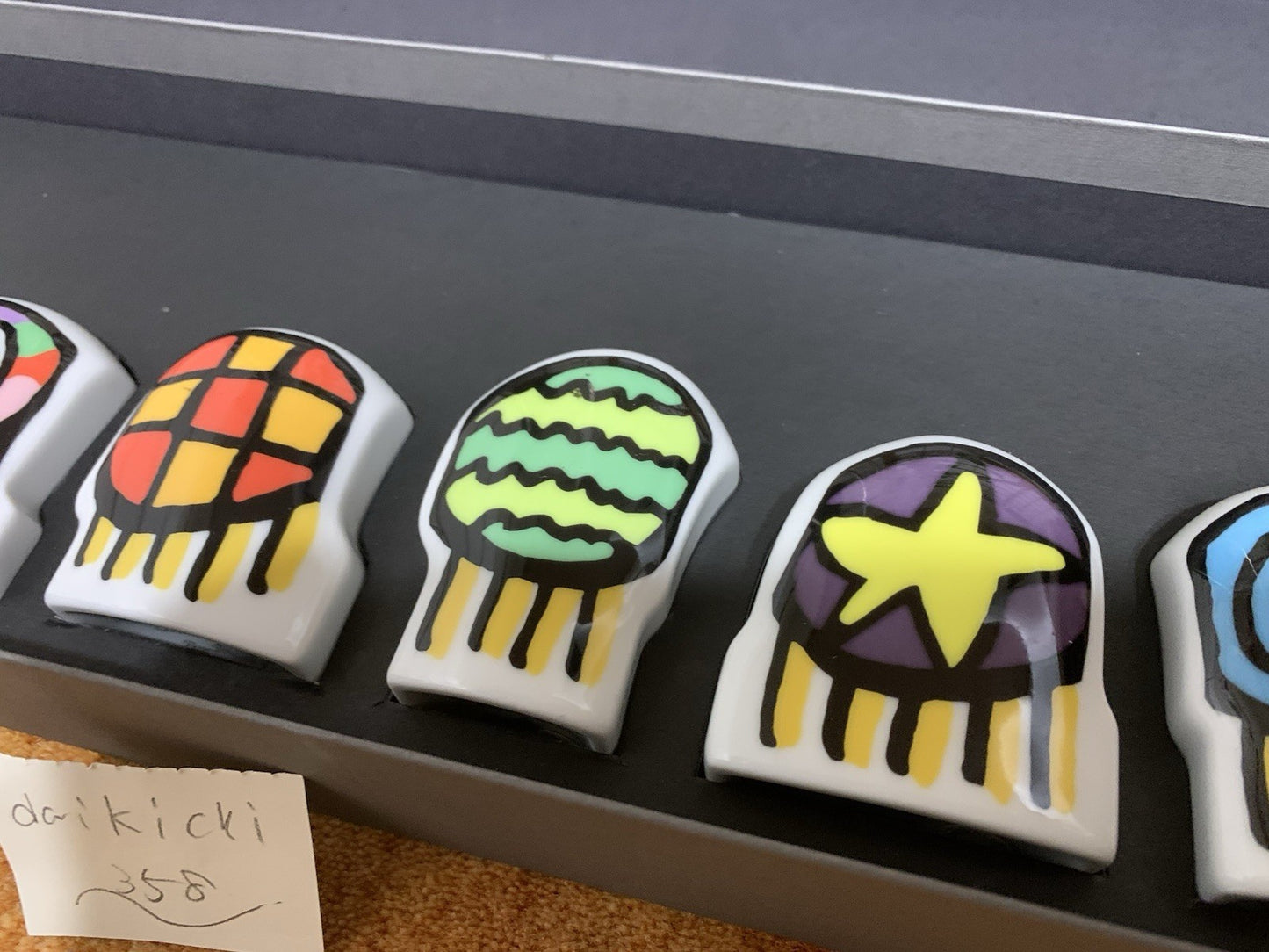Multicolor ceramic character set by James Rizzi