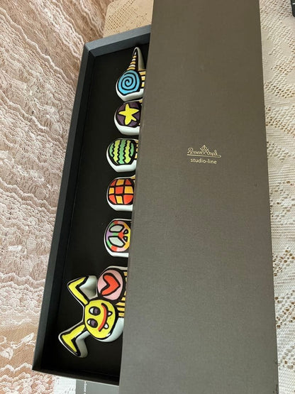 Multicolor ceramic character set by James Rizzi
