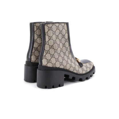 Gucci Women'S Interlocking G Lug Sole Ankle Boots Gg Coated Canvas With Leather